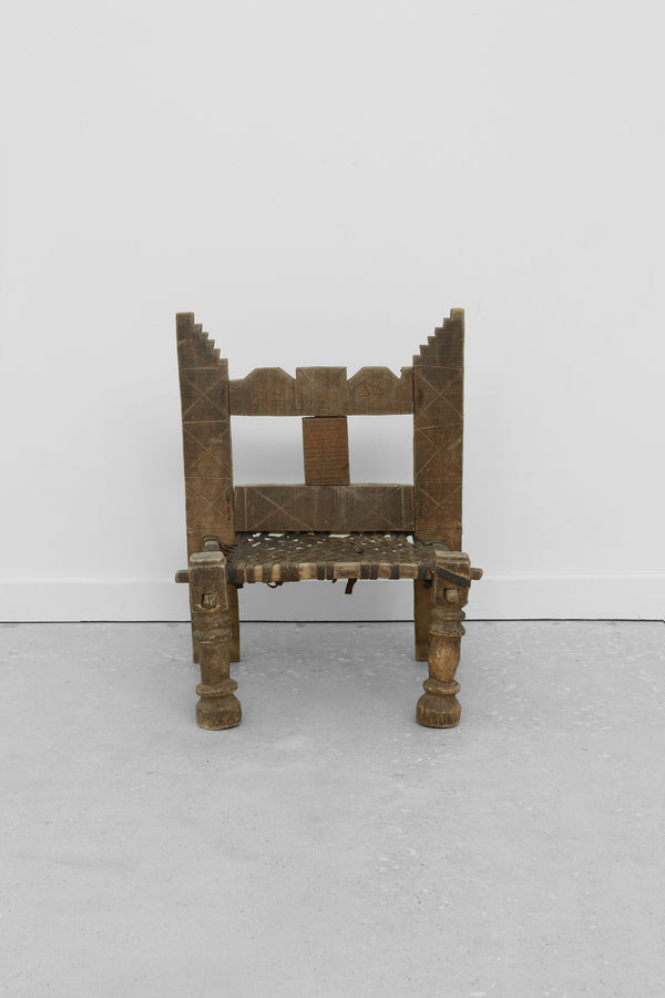 Carved Wood + Woven Leather Chair