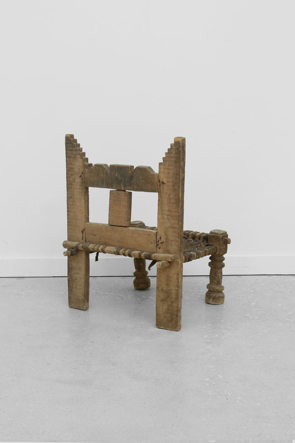 Carved Wood + Woven Leather Chair