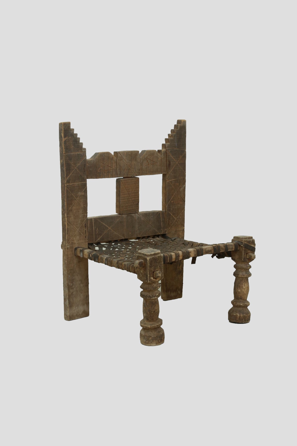 Carved Wood + Woven Leather Chair
