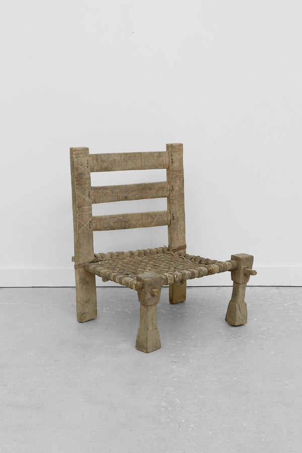 Carved Wood + Woven Leather Chair