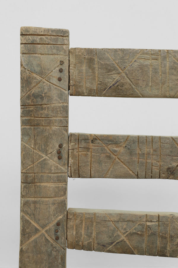 Carved Wood + Woven Leather Chair