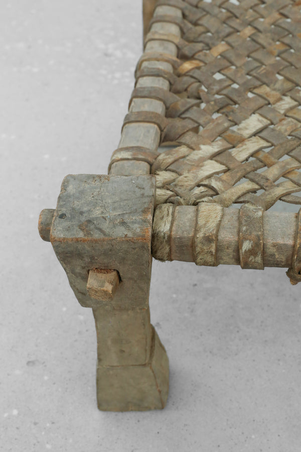 Carved Wood + Woven Leather Chair